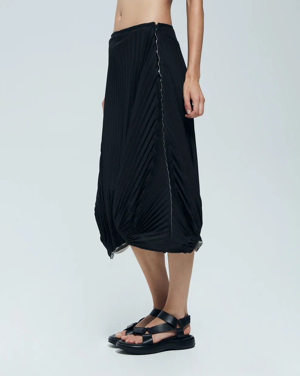 Asymmetric pleated skirt